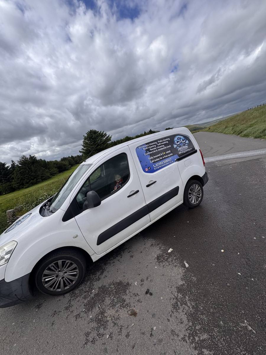 C&C Precision van attending a gutter clearing job in Oldham